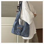 鉚釘拼接 復古扣飾 牛仔腋下單肩包